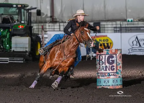 Pushy, a bay mare, turning a barrel with Alyssa at the 2025 Big Bang
